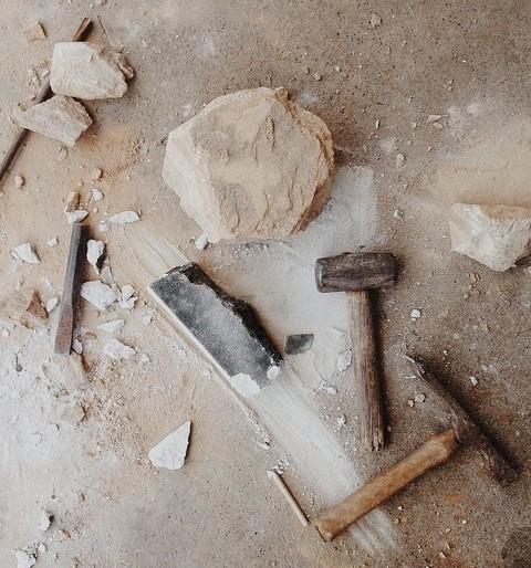 Artisan crafting custom marble piece